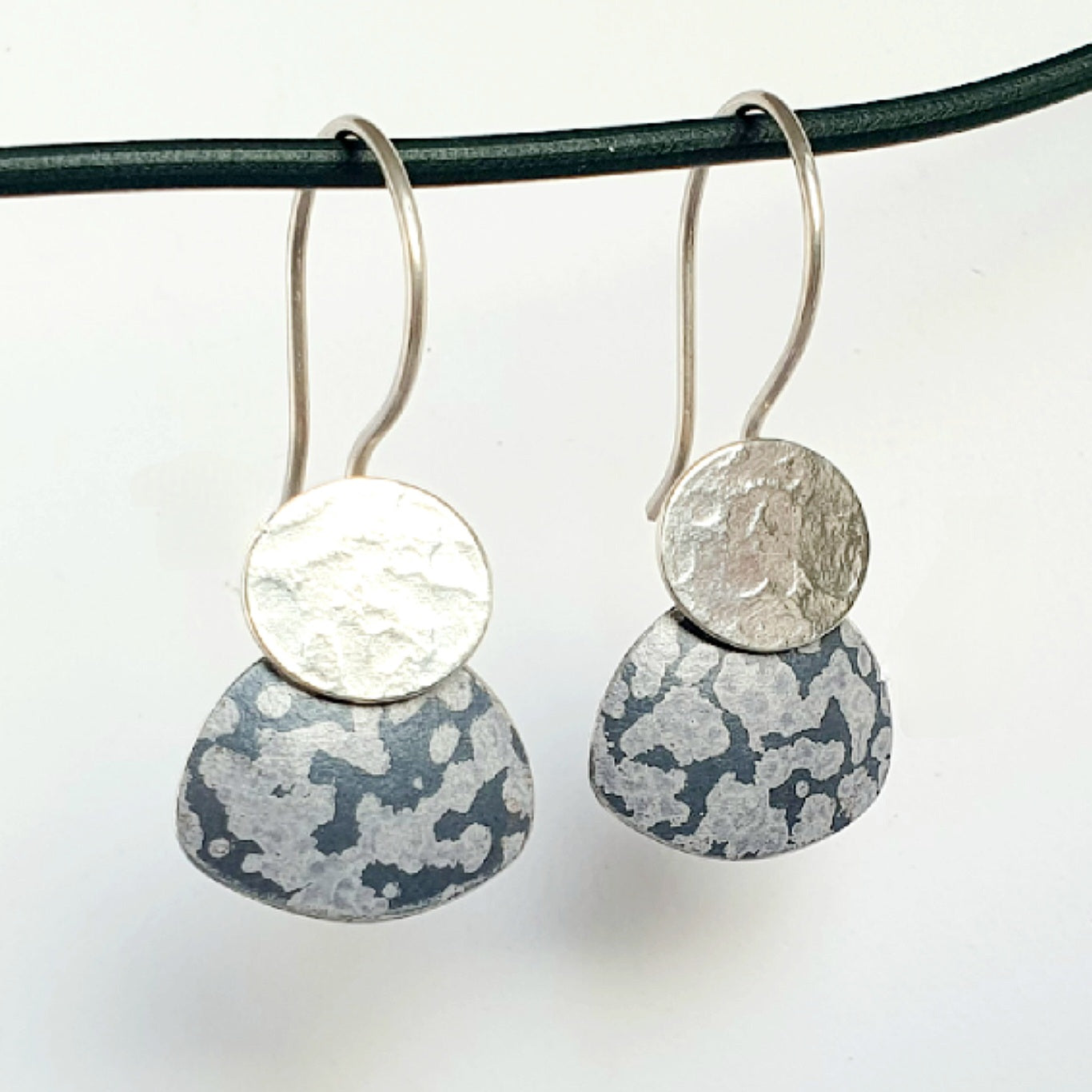 LCH2 Little silver oval drop earrings with patterned anodised aluminium skirt
