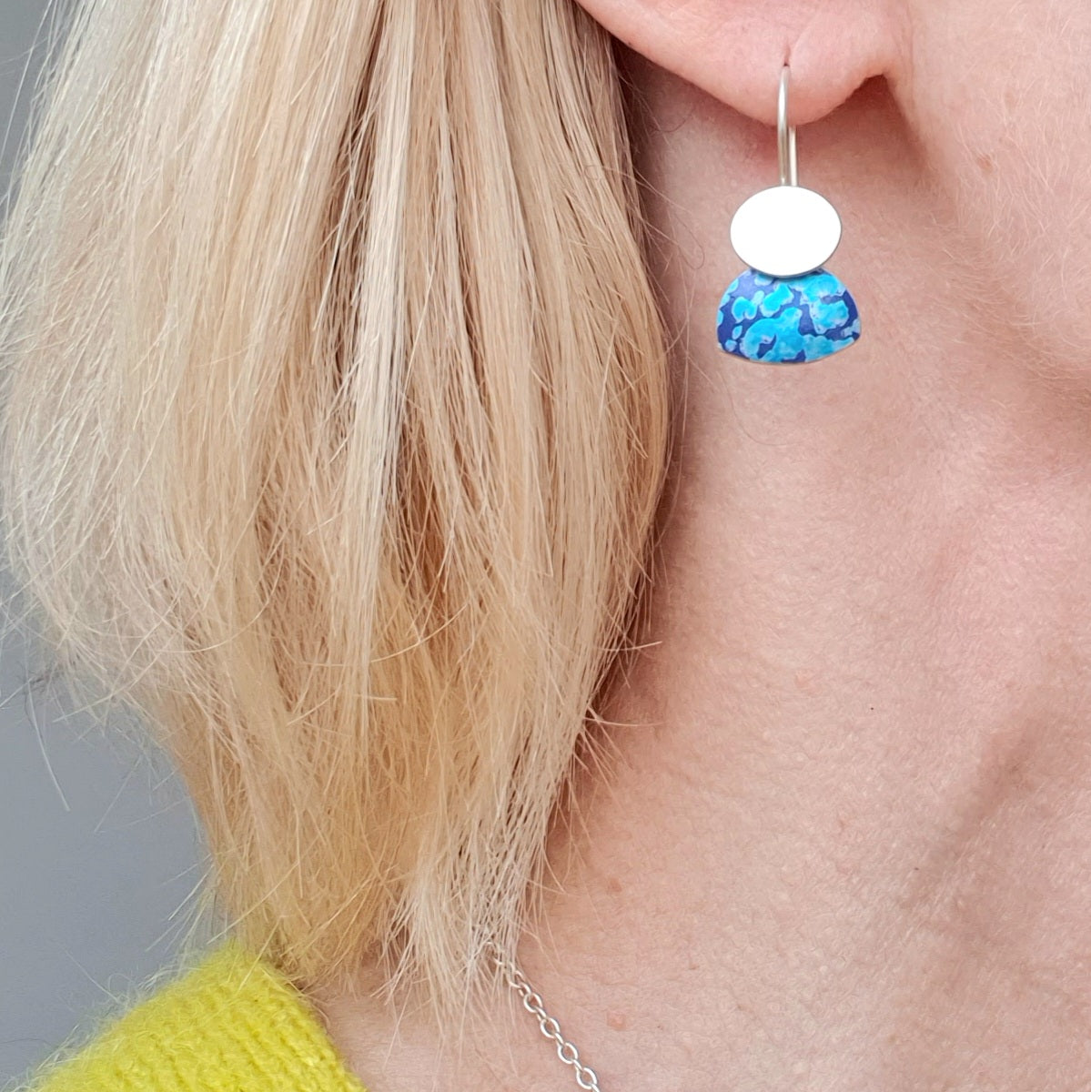 LCH2 Little silver oval drop earrings with patterned anodised aluminium skirt