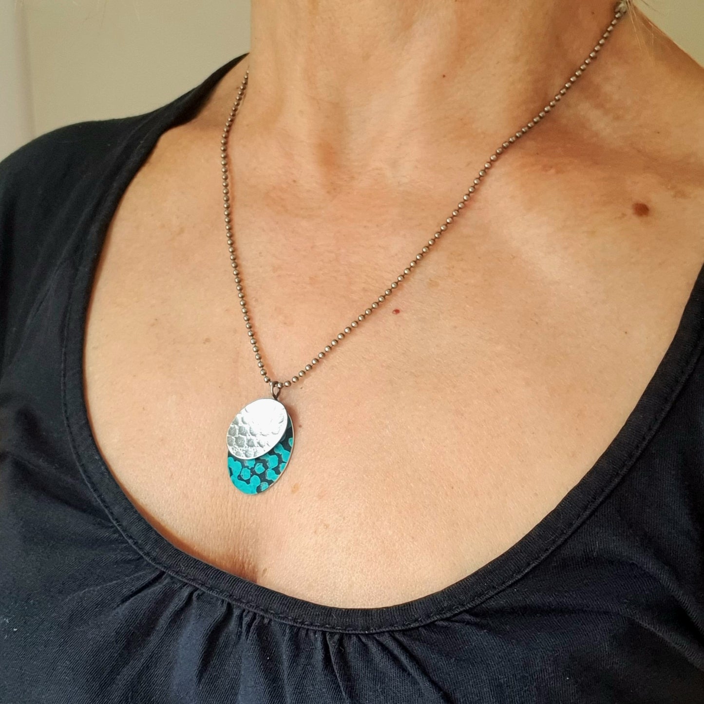 SL20 Oxidised textured silver and turquoise blue spotty ovals pendant