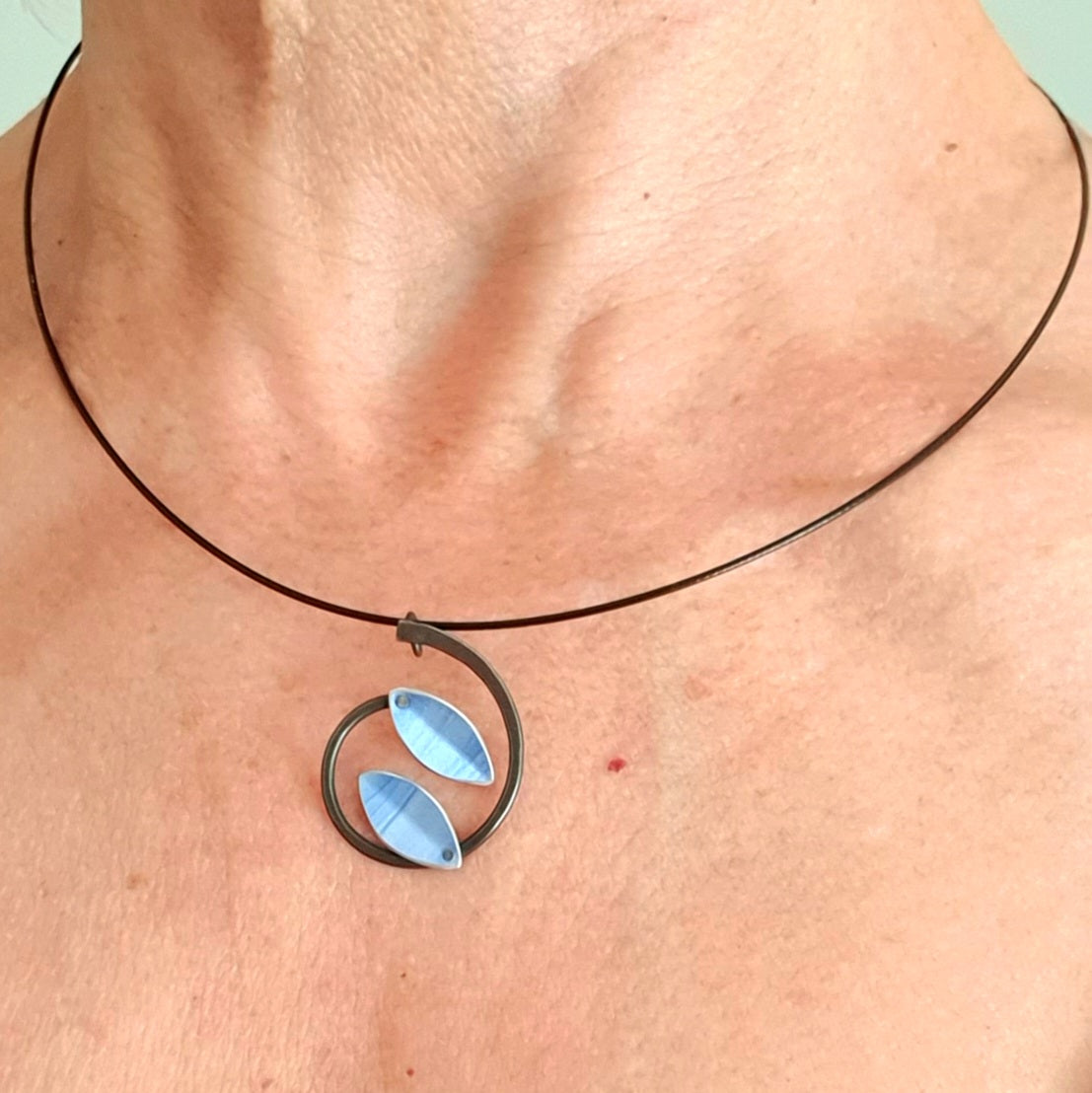 SL19 Light blue leaves pendant on black neckwire