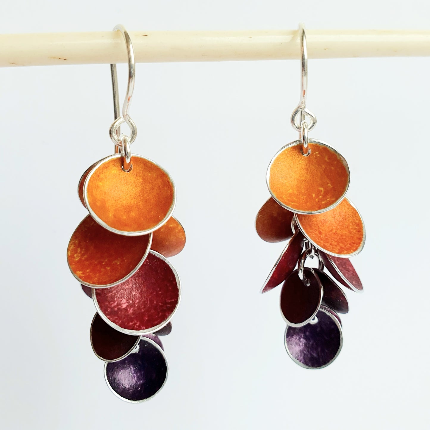 CD25 Ten concave disc cluster drop earrings