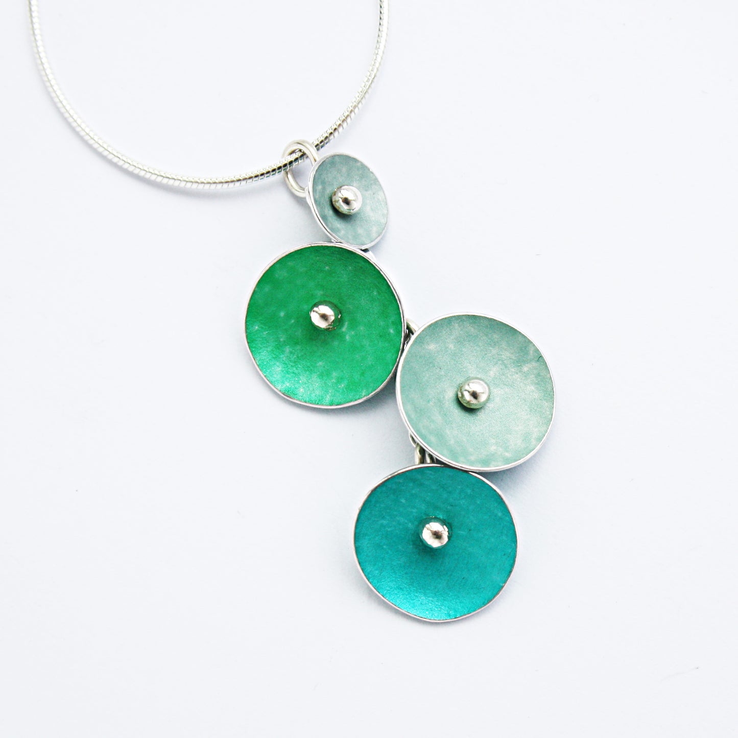 CD12 Four concave discs pendant