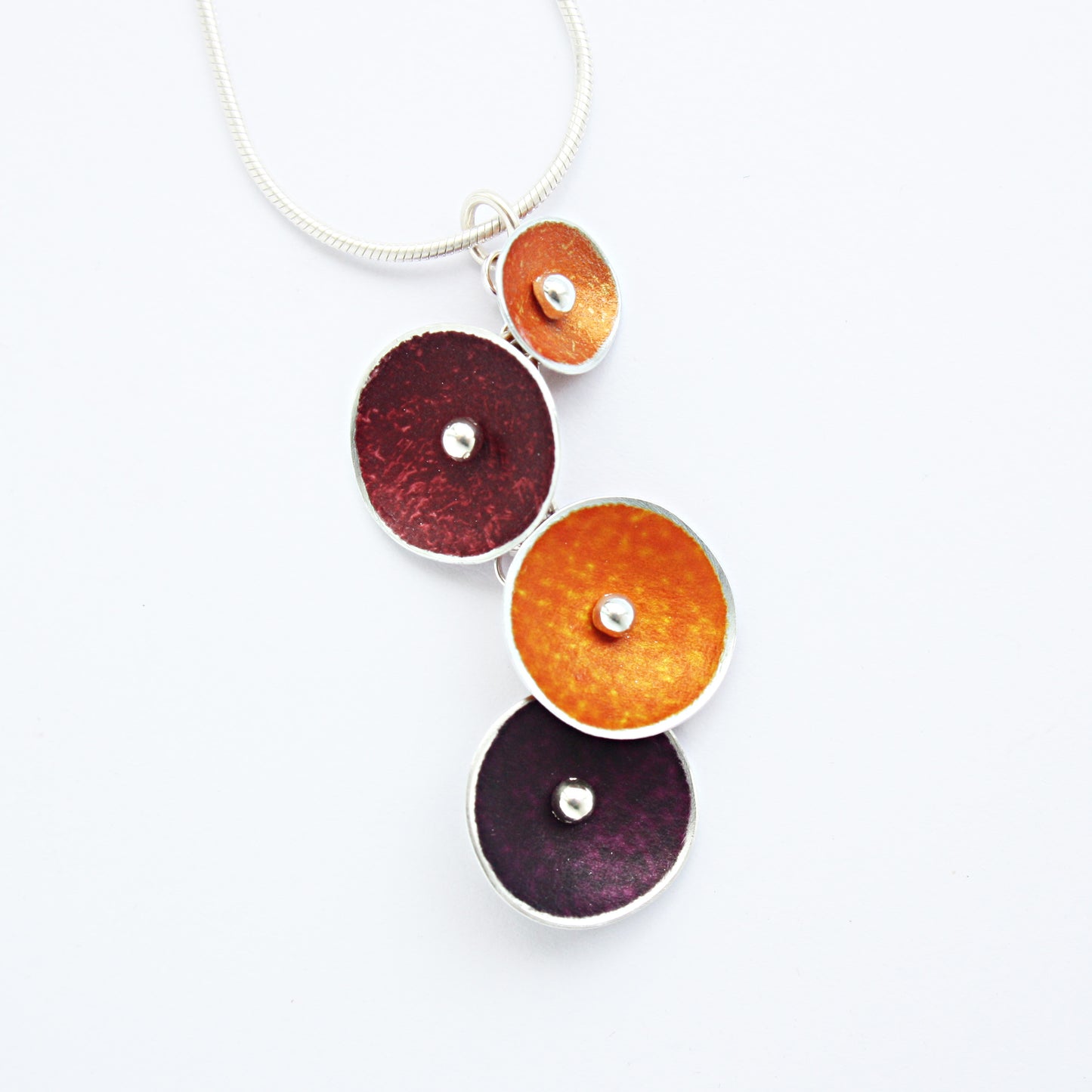CD12 Four concave discs pendant