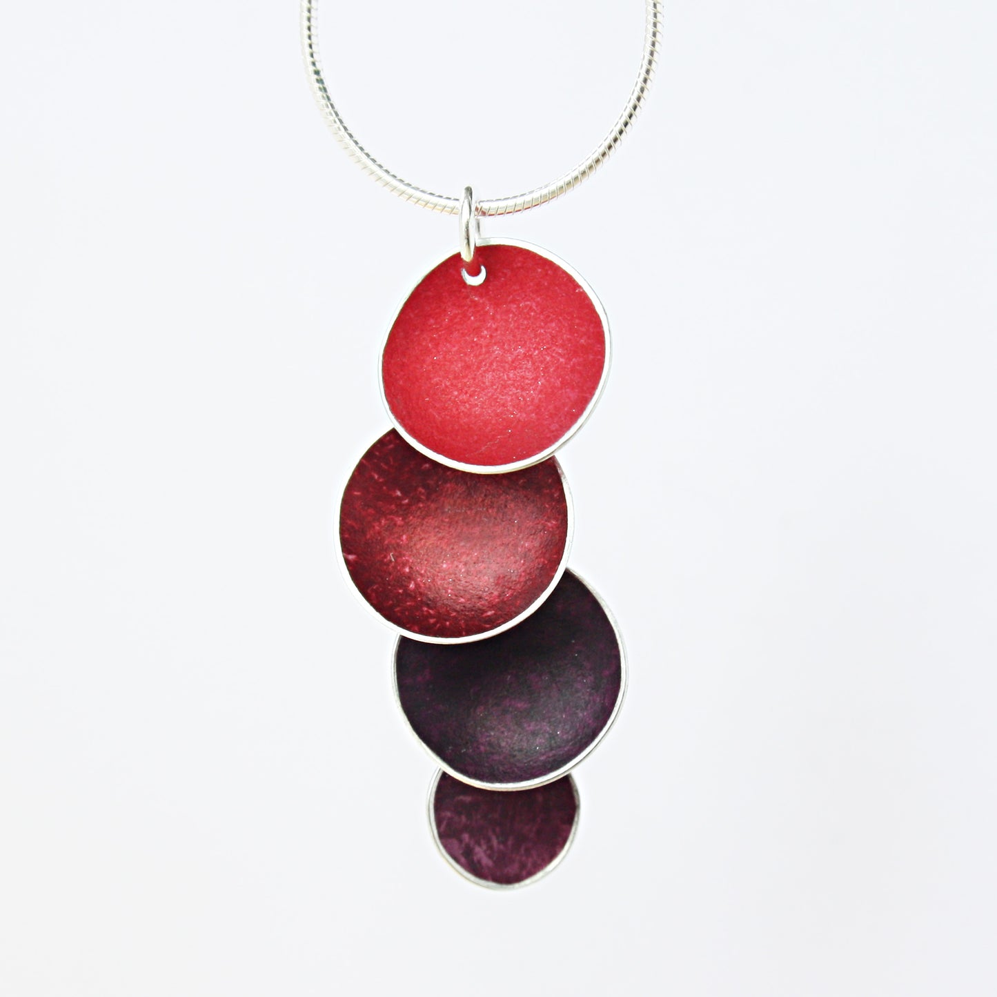 CD13 Four colour concave disc pendant