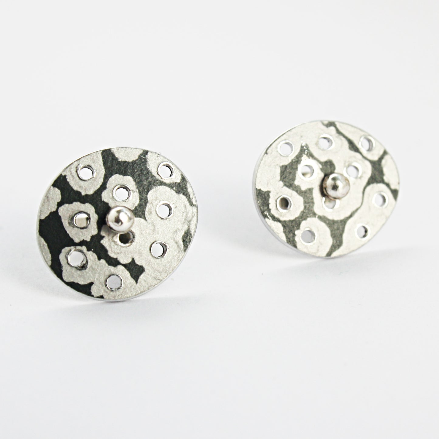 TS10 Perforated disc stud earrings