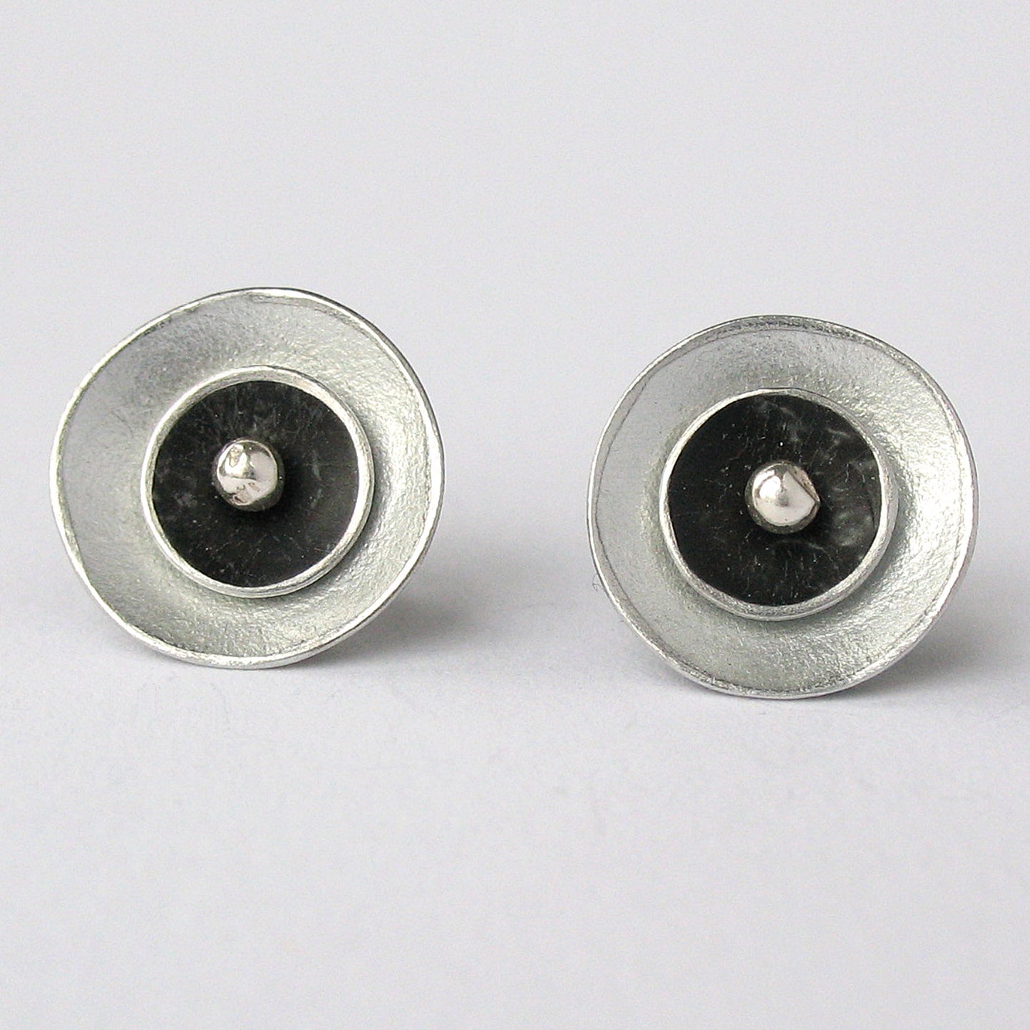 CD1 Double concave disc stud earrings