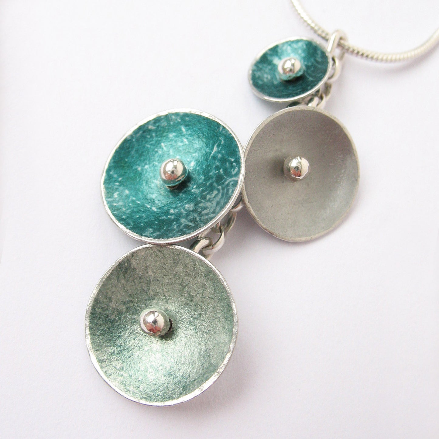 CD12 Four concave discs pendant