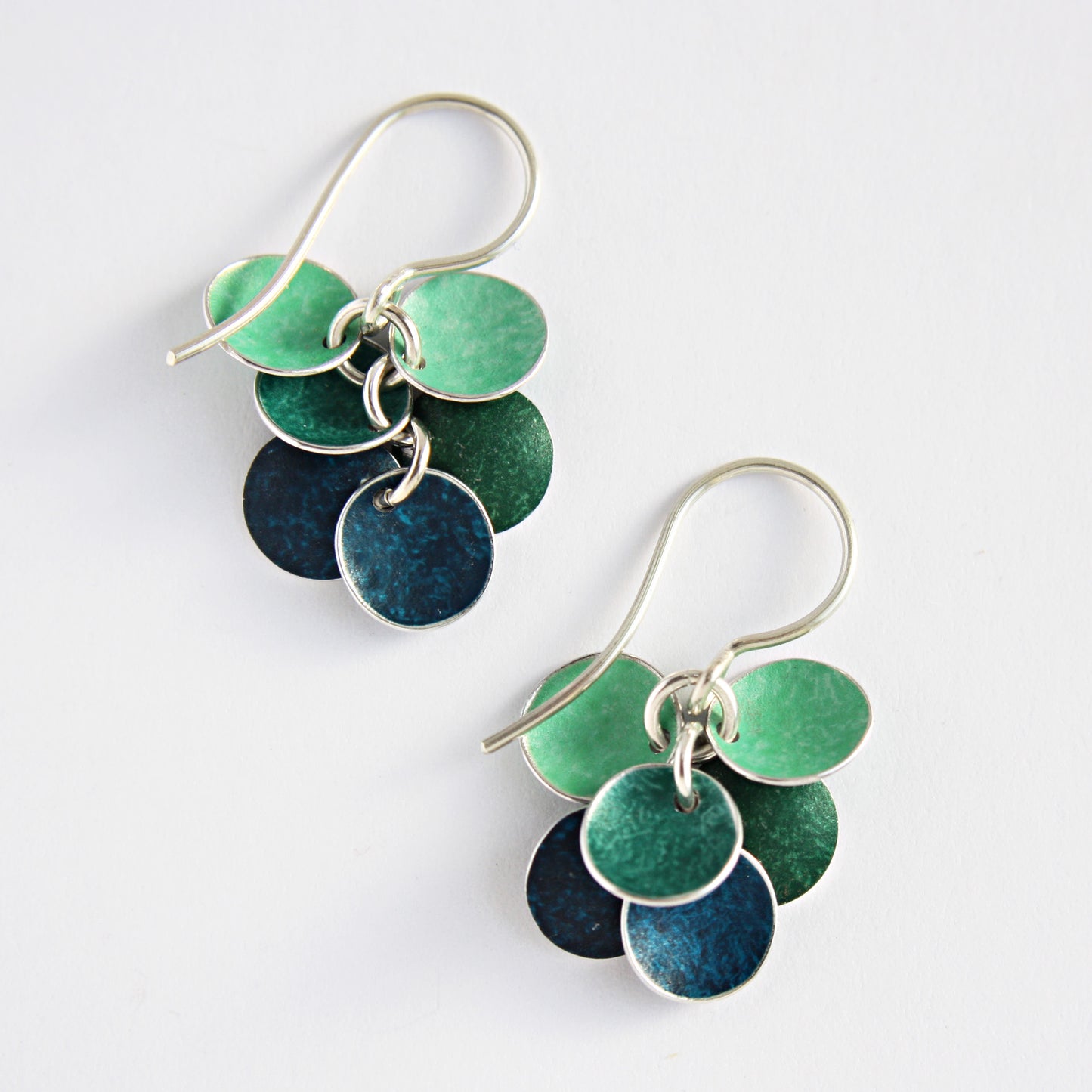 CD18 Six concave disc drop earrings