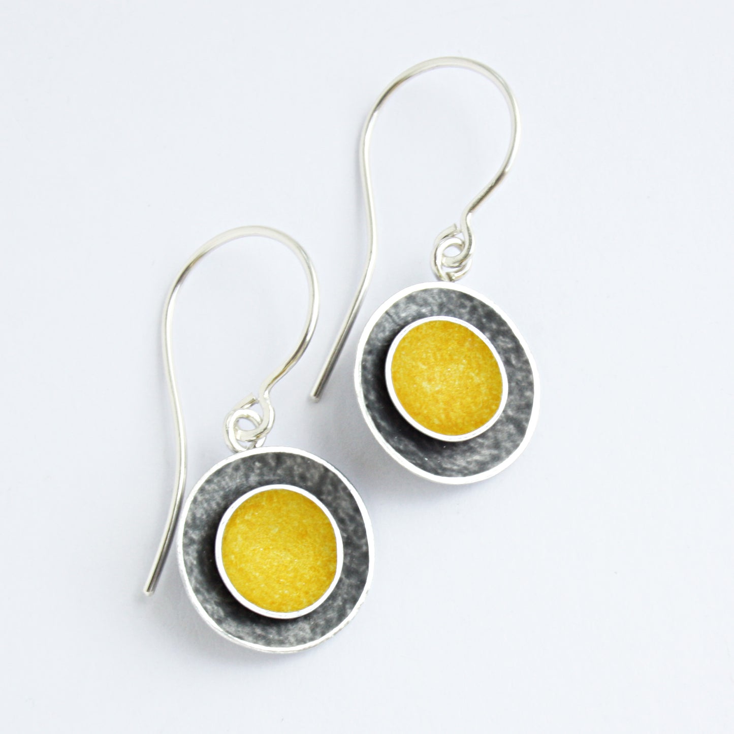 CD29 Double concave disc drop earrings