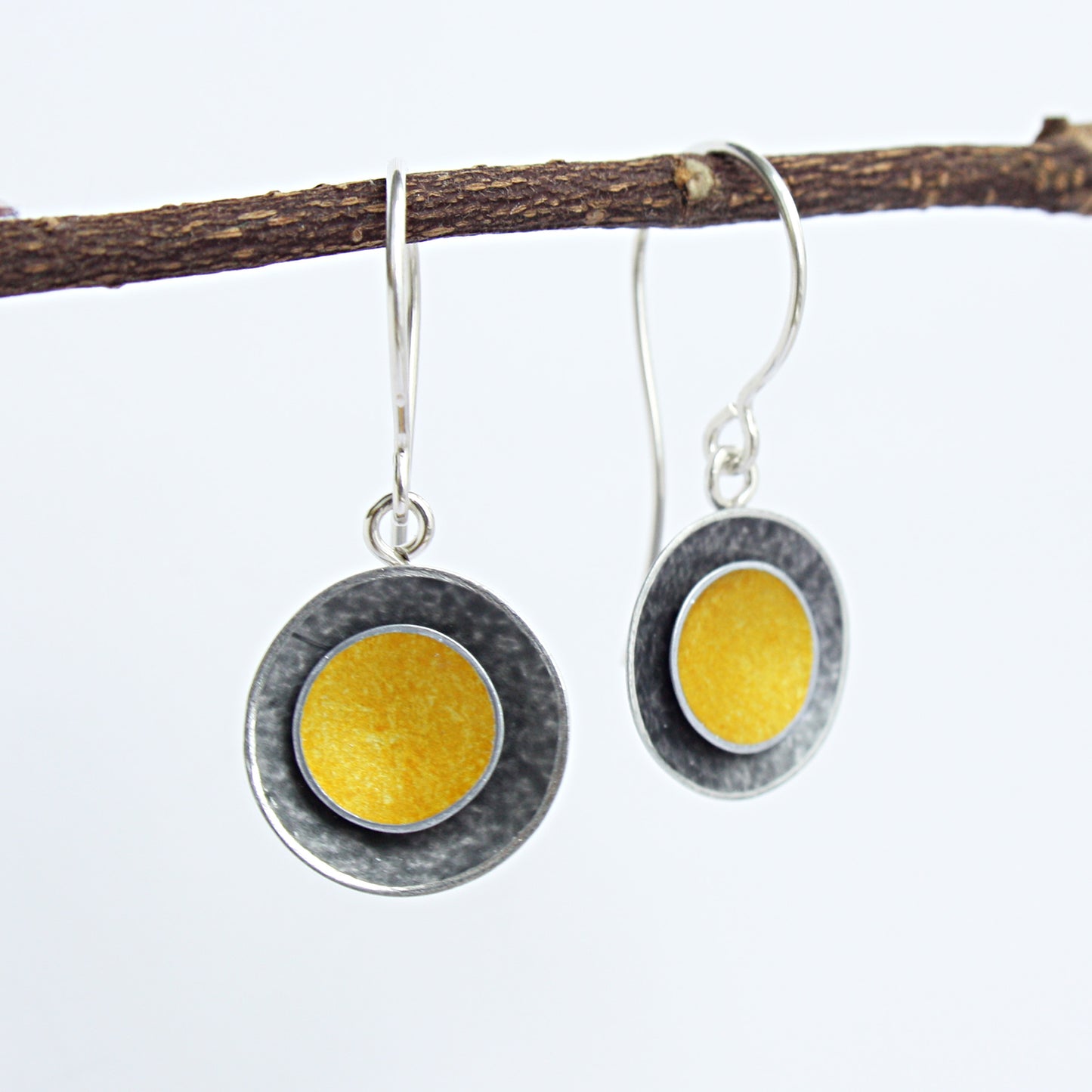 CD29 Double concave disc drop earrings