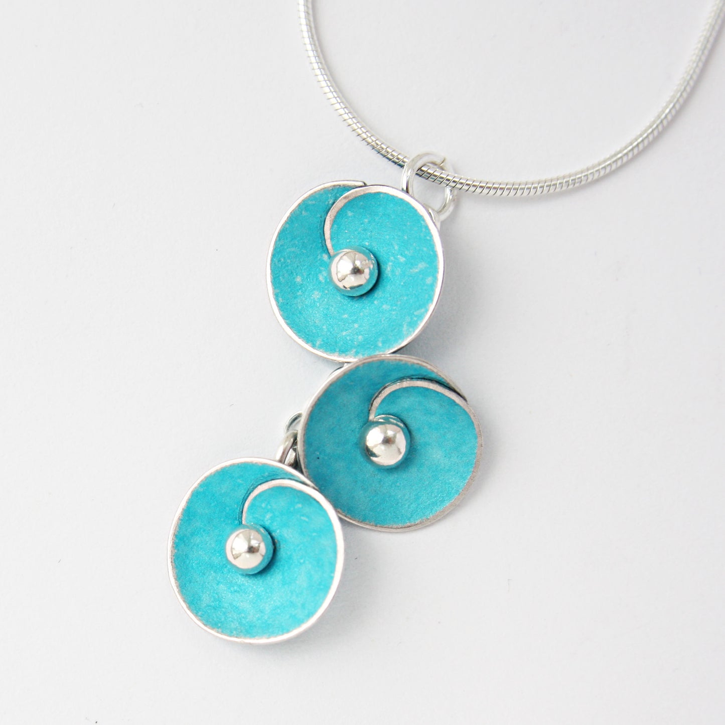 SP4 Triple spiral discs pendant