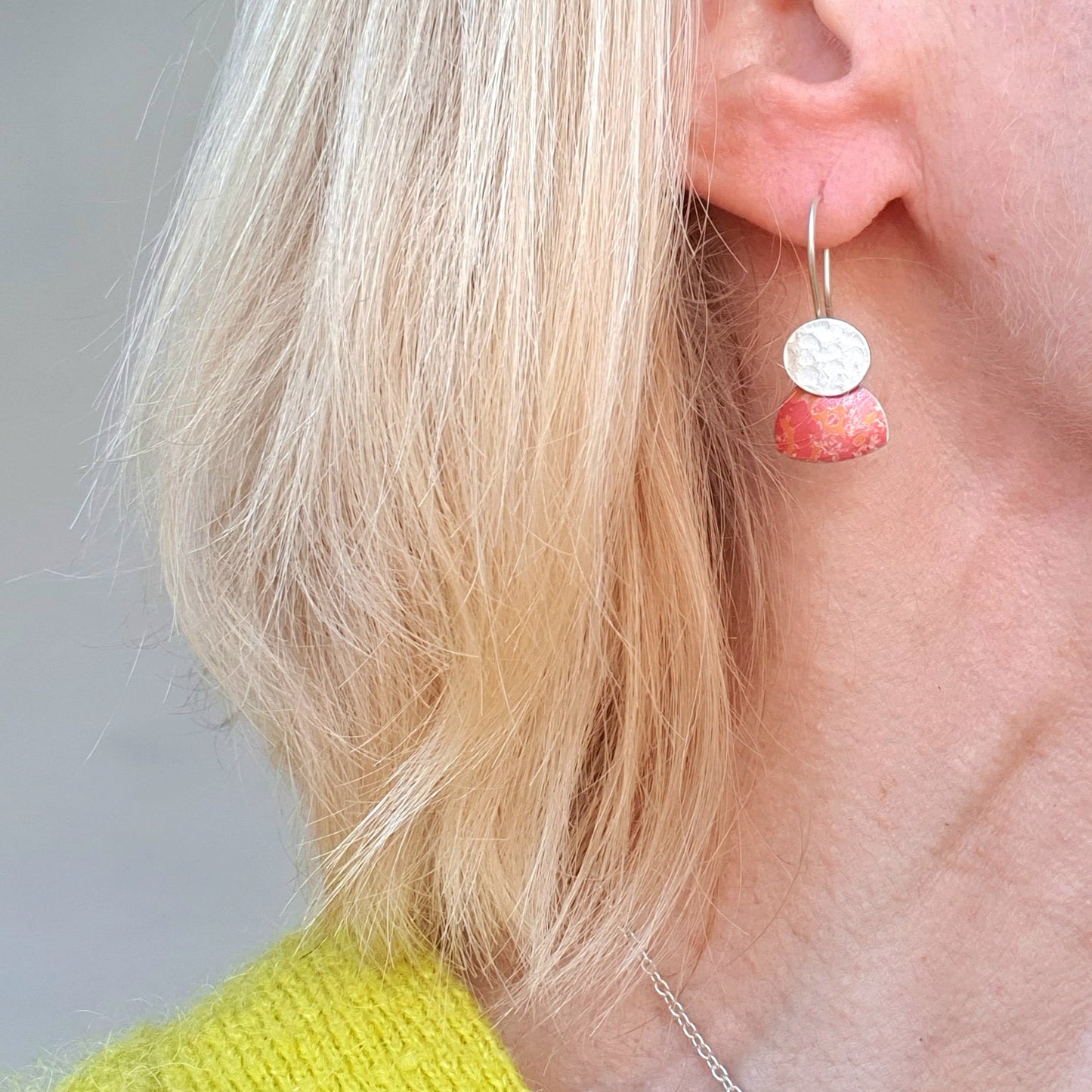 LCH2 Little silver oval drop earrings with patterned anodised aluminium skirt