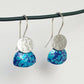 LCH2 Little silver oval drop earrings with patterned anodised aluminium skirt