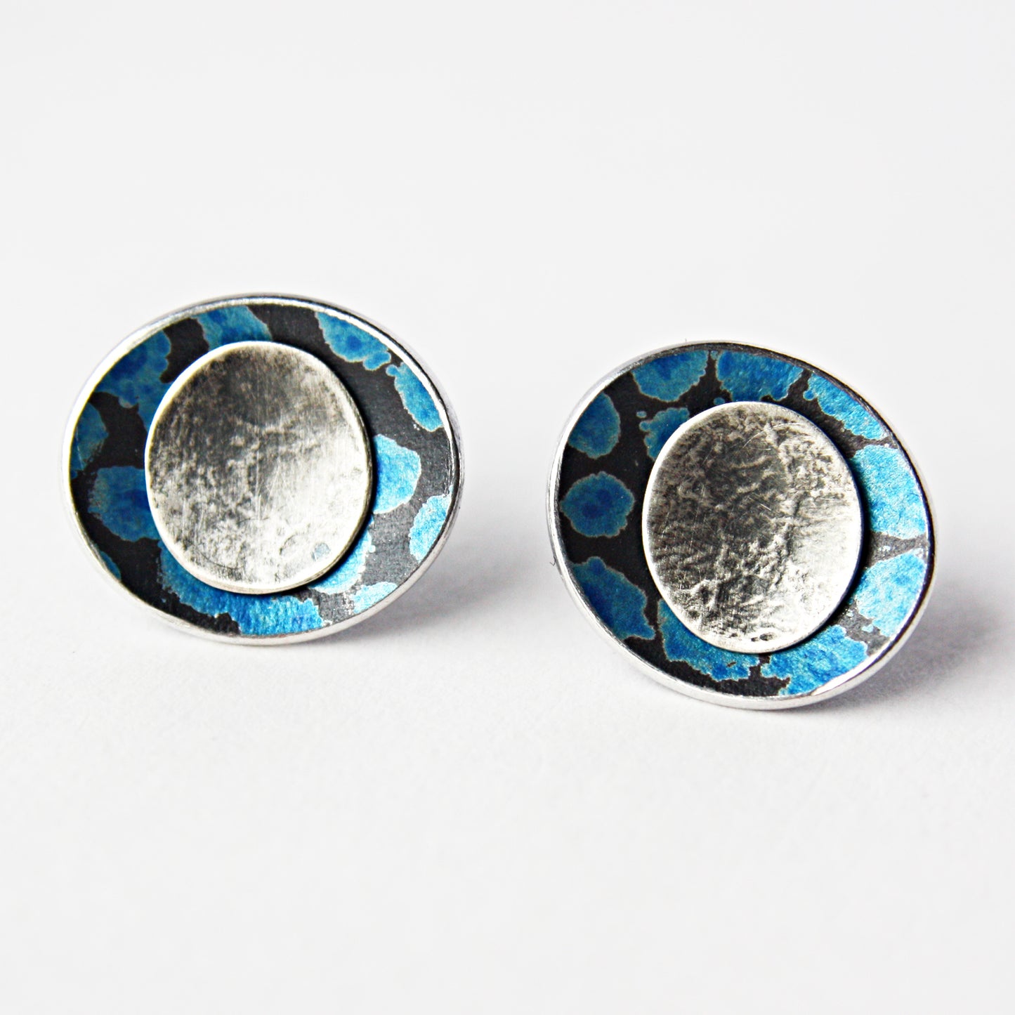 SL37 Spotty petrol blue concave oval stud earrings with silver centre