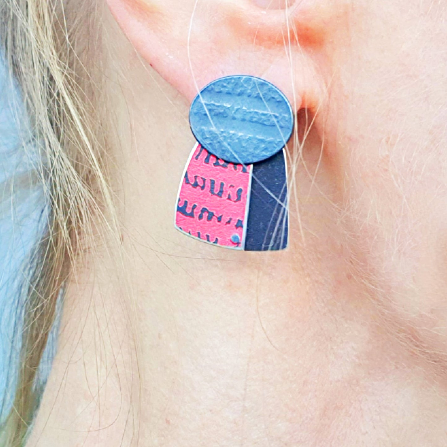 SL36 Oxidised silver stud earrings with red/black riveted square