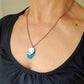 SL20 Oxidised textured silver and turquoise blue spotty ovals pendant